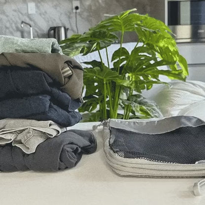 COMPRESS'BAG: DER ORGANIZER, DER IHRE KLEIDUNG KOMPRIMIERT UND DEN PLATZ IN IHREM KOFFER VERDOPPELT